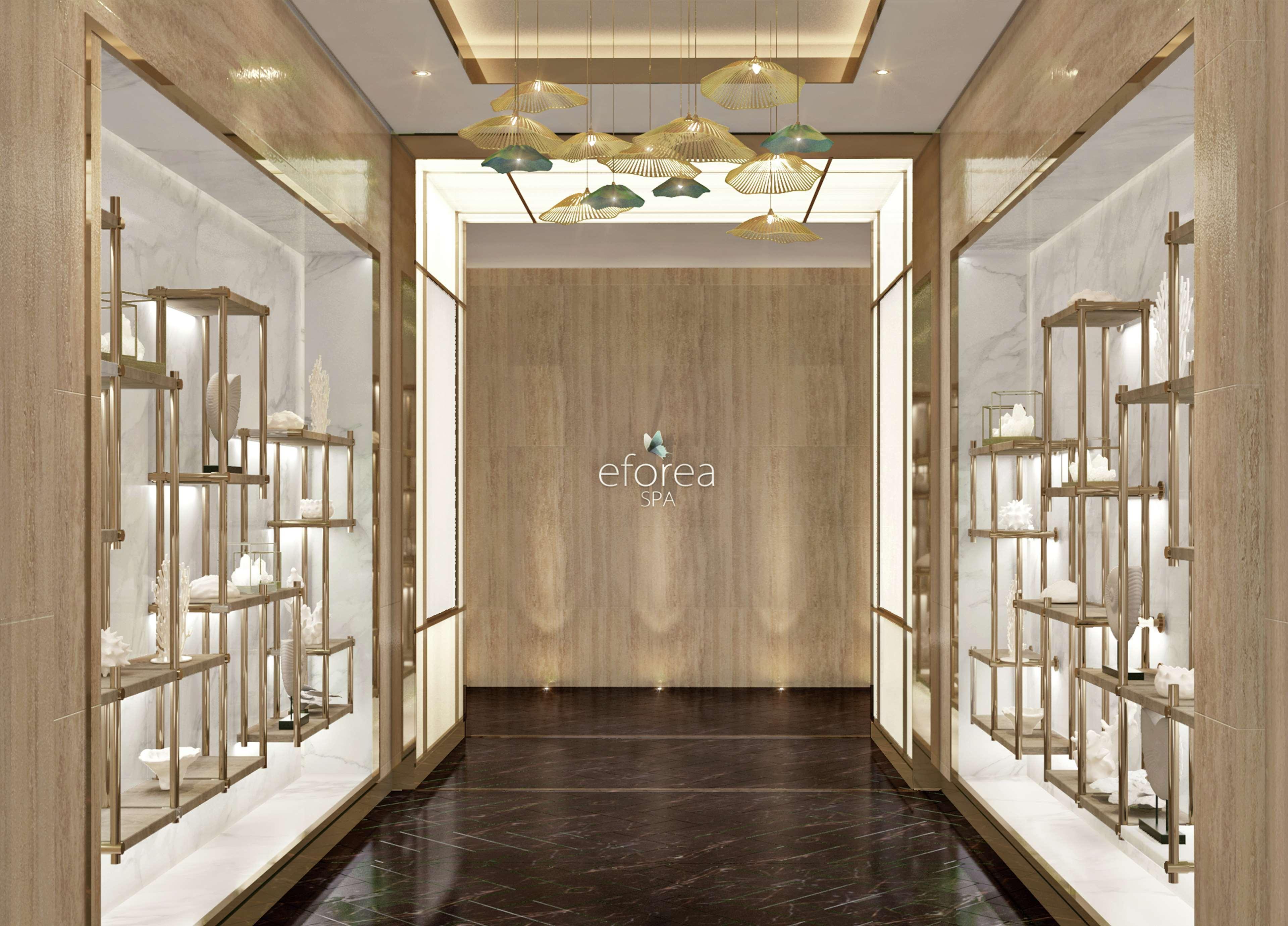 Hilton Doha The Pearl Hotel Bagian luar foto Entrance of the hotel